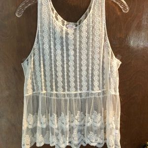 White sheer design embroidered tank top.